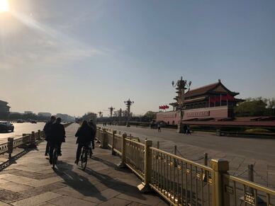 Riding past the forbidden city and Tiananmen square